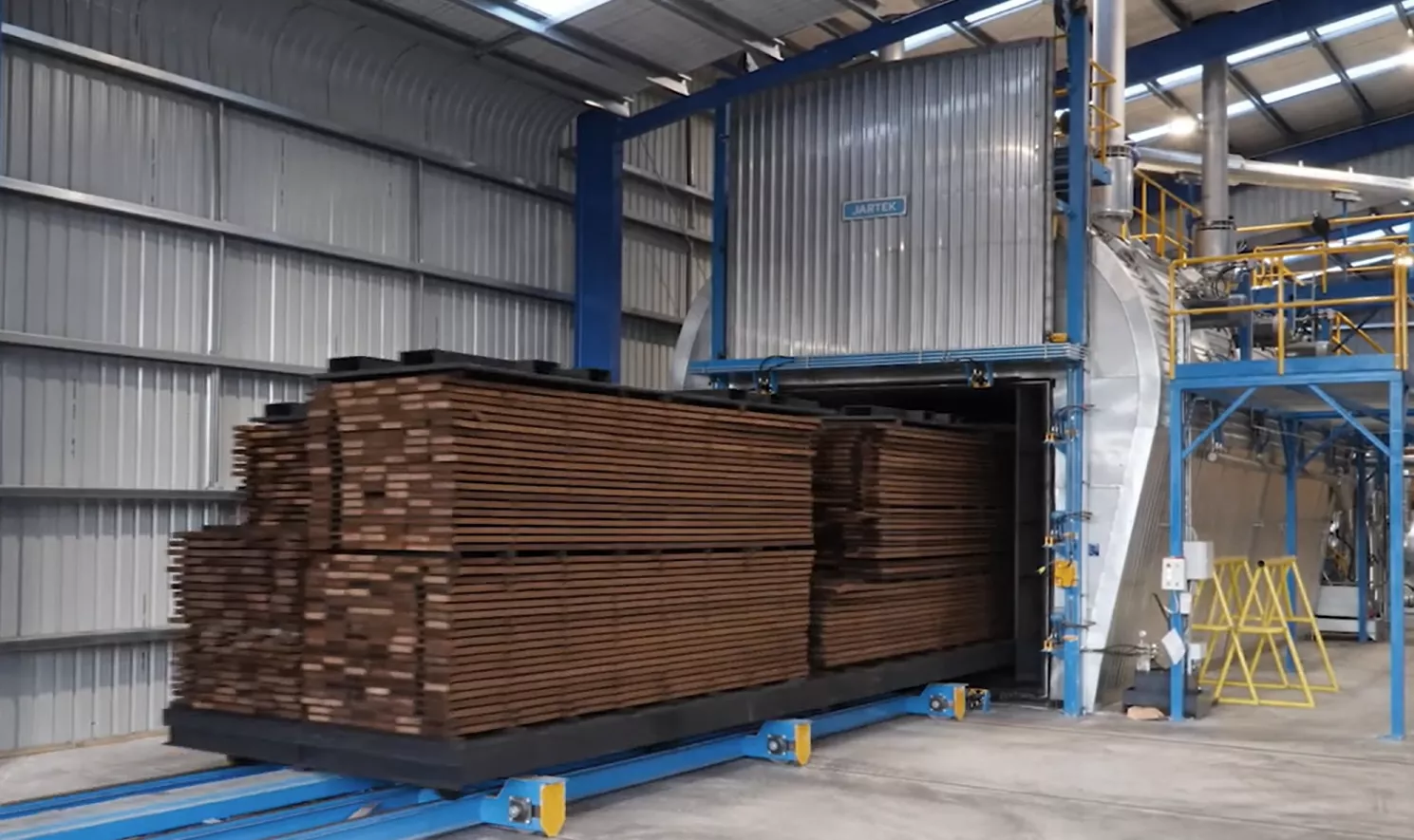 Thermally modified timber exiting TMT Plant after completing thermal modification process